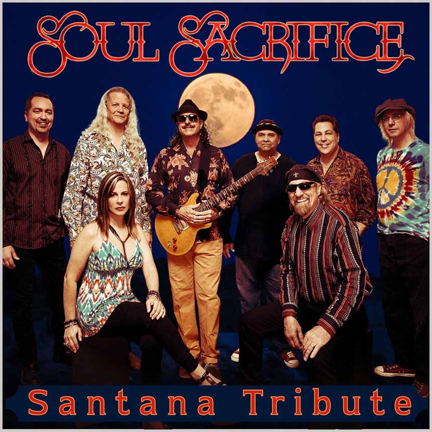 picture of 8 members of the Soul Sacrifice Santana Tribute band in front of a full moon